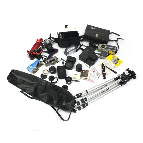 129 - Box of assorted cameras, lenses and accessories including Canon and Sony examples, together with a t... 