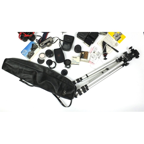 129 - Box of assorted cameras, lenses and accessories including Canon and Sony examples, together with a t... 