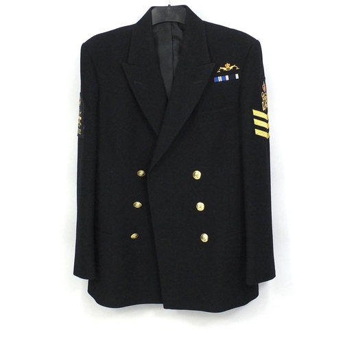 610 - Military interest jacket with cloth patches and Naval buttons