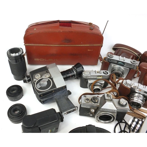 134 - Group of vintage cameras and accessories including Praktica, Bolex, Kodak and Minolta etc