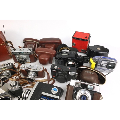 134 - Group of vintage cameras and accessories including Praktica, Bolex, Kodak and Minolta etc