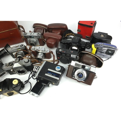 134 - Group of vintage cameras and accessories including Praktica, Bolex, Kodak and Minolta etc