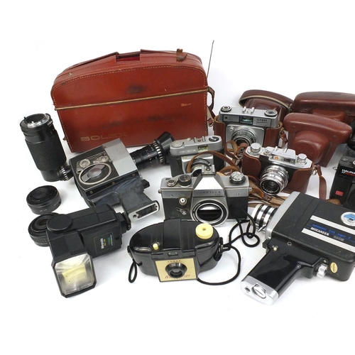 134 - Group of vintage cameras and accessories including Praktica, Bolex, Kodak and Minolta etc