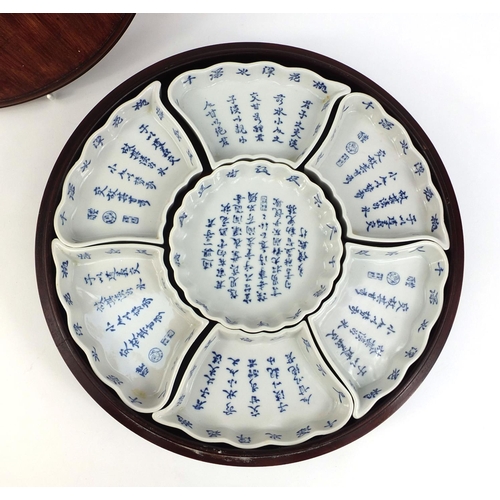 2212 - Oriental porcelain Lazy Suzy decorated with calligraphy script, 33cm in diameter