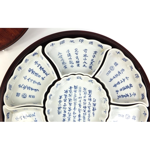 2212 - Oriental porcelain Lazy Suzy decorated with calligraphy script, 33cm in diameter