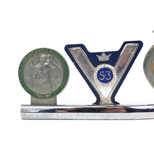 133 - Group of four vintage car badges including a St Christopher Be My Guide example by Pinches of London... 