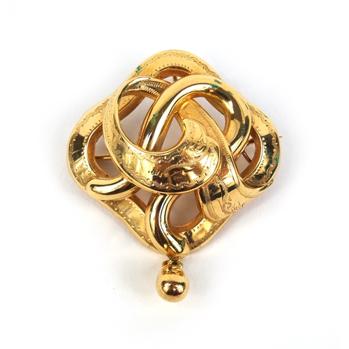 823 - 18ct gold brooch with engraved decoration, G D & Co makers mark, 4.2cm long, approximate weight 4.7g