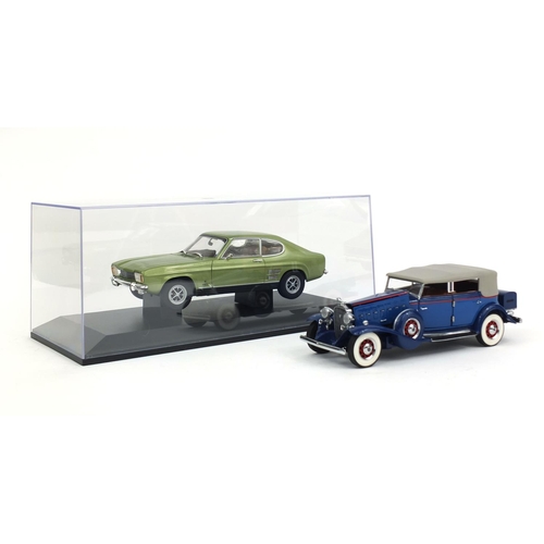 2331 - Two die cast model vehicles comprising a Minichamps 1969-74, Ford Capri 1:18 scale and a Franklin Mi... 