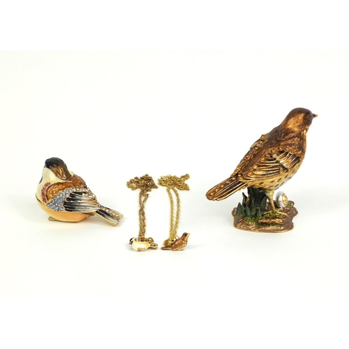 2371 - Two enamelled and jewelled bird trinkets, together with two enamelled bird pendants, each on a gold ... 