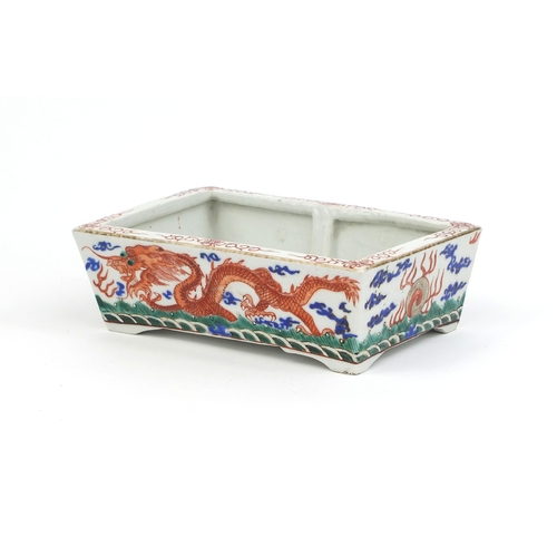 359 - Chinese rectangular porcelain planter, hand painted with dragons chasing the flaming pearl, six figu... 