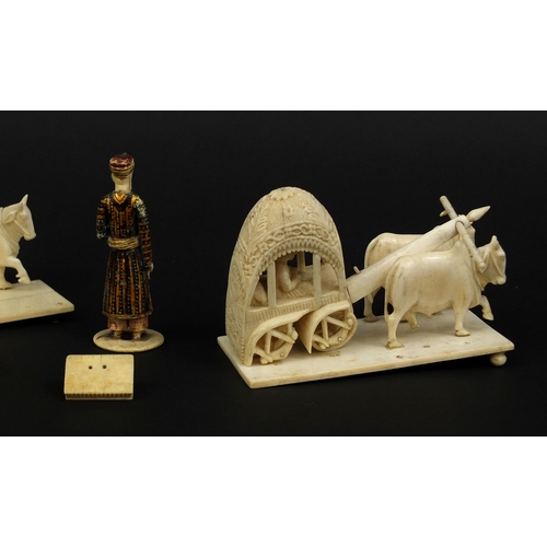 527 - Group of Indian ivory including a painted figure of a robed gentleman, rectangular box with slide li... 