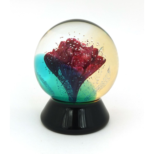 2106 - Caithness 'first love' limited edition glass paperweight decorated with flower, No.483/650, factory ... 