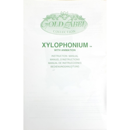 2387 - Boxed gold label collection xylophonium, with animation musical box, 13cm high x 28cm wide x 22cm de... 