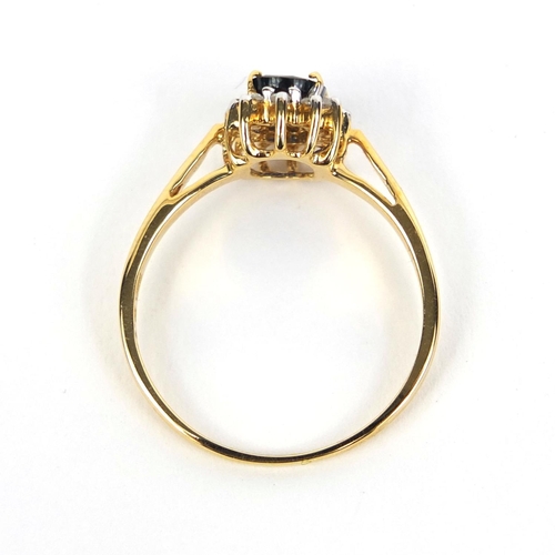 2629 - 18ct gold sapphire and diamond ring set with a central sapphire and twelve diamonds, size Q, approxi... 