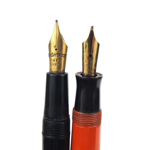 61 - Group of three vintage fountain pens comprising an orange Parker duofold, Conway Stewart 57 and a Wa... 
