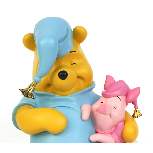 2323 - Disney polyresin figure of Winie the Pooh and Piglet, stamped Disney to the base, 32cm high