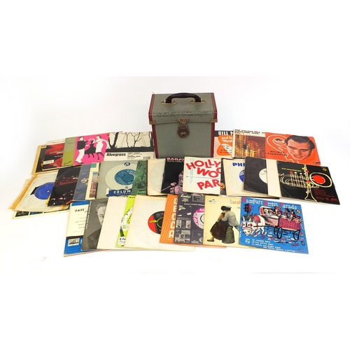 2304 - Collection of  45 RPM jazz records, housed in a carrying case