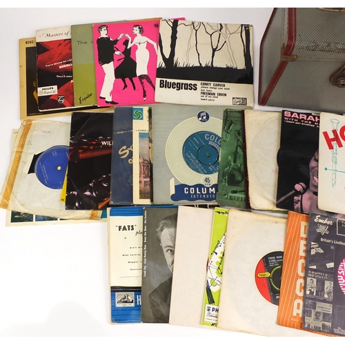 2304 - Collection of  45 RPM jazz records, housed in a carrying case