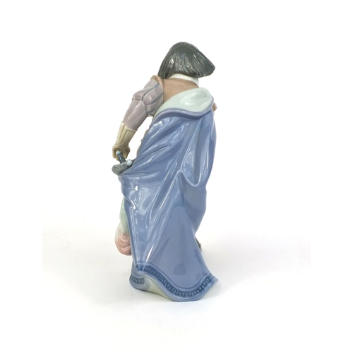 2078 - Lladro figure of Musketeer Aramis, factory marks and No.6119 to the base, 22cm high