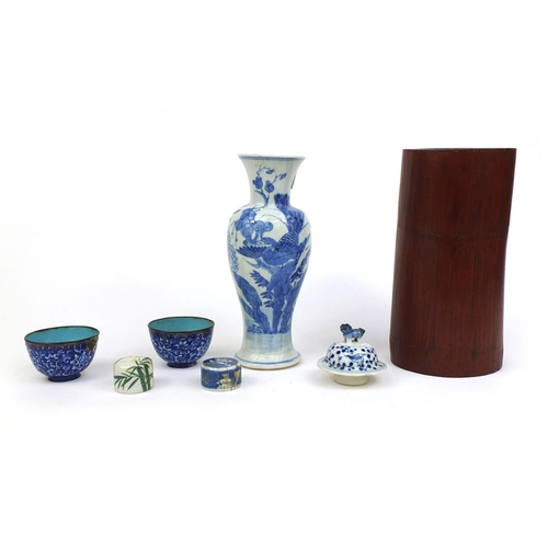 411 - Group of Chinese ceramics and wooden ware including a blue and white porcelain vase, hand painted wi... 