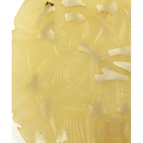 440 - Chinese circular jade pendant carved with two figures together with one other, the largest 6cm high