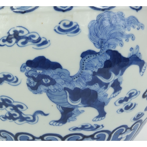 387 - Chinese blue and white porcelain jardinière, hand painted with kylin lions amongst clouds, four figu... 