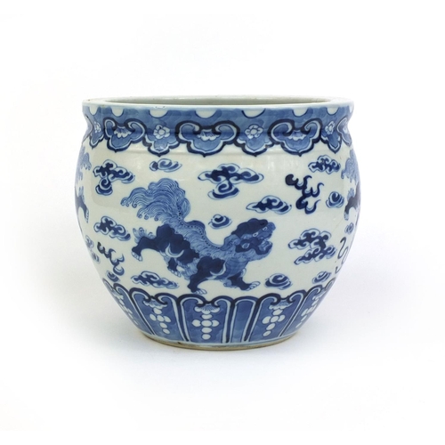 387 - Chinese blue and white porcelain jardinière, hand painted with kylin lions amongst clouds, four figu... 