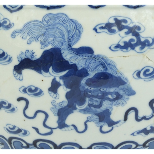 387 - Chinese blue and white porcelain jardinière, hand painted with kylin lions amongst clouds, four figu... 