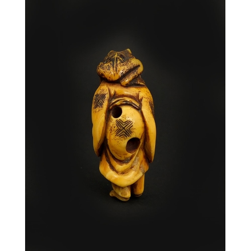 453 - Japanese carved ivory netsuke of a man with a frog on his head, 5cm high