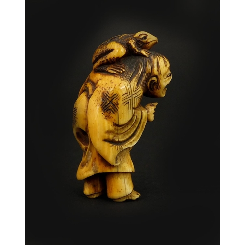 453 - Japanese carved ivory netsuke of a man with a frog on his head, 5cm high