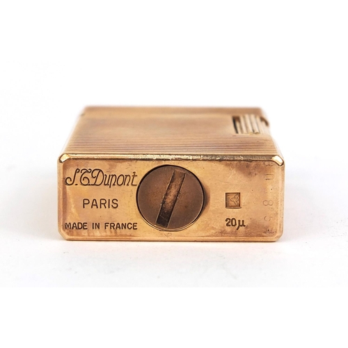 53 - Boxed Dupont gold plated lighter with engine turned decoration, factory marks to the base, 4.7cm hig... 
