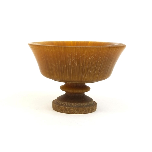 435 - Chinese turned Resin wine cup, 7cm high x 11cm in diameter, approximate weight 230.0g