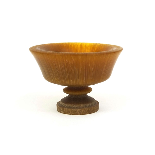 435 - Chinese turned Resin wine cup, 7cm high x 11cm in diameter, approximate weight 230.0g