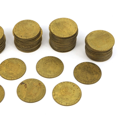 229 - Large collection of 18th century brass gaming tokens, each 2.5cm in diameter