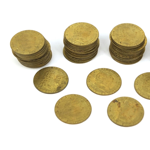 229 - Large collection of 18th century brass gaming tokens, each 2.5cm in diameter