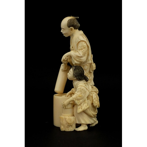 456 - Well detailed Japanese carved ivory okimono of a man and lady washing, character marks to the base, ... 