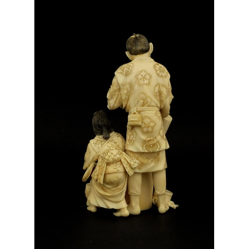 456 - Well detailed Japanese carved ivory okimono of a man and lady washing, character marks to the base, ... 