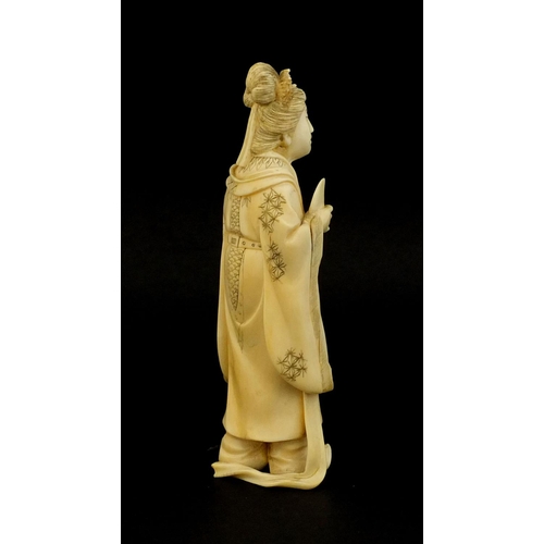 458 - Japanese carved ivory okimono of a lady holding a musical instrument, 12cm high