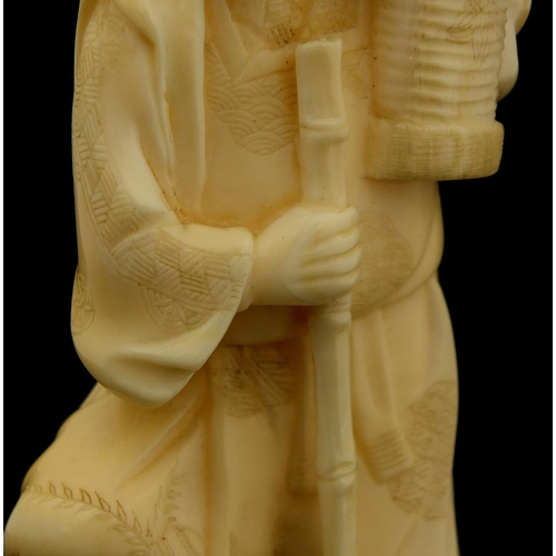 460 - Japanese carved ivory okimono of a man holding a bucket and rake, character marks to the base, 15.5c... 