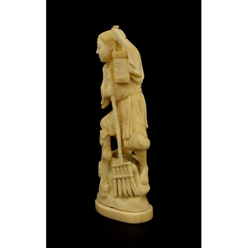 460 - Japanese carved ivory okimono of a man holding a bucket and rake, character marks to the base, 15.5c... 