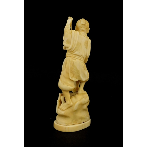 460 - Japanese carved ivory okimono of a man holding a bucket and rake, character marks to the base, 15.5c... 