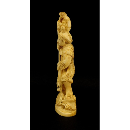 459 - Japanese carved ivory okimono of a man and monkey, red inset character marks to the base, 19.5cm hig... 