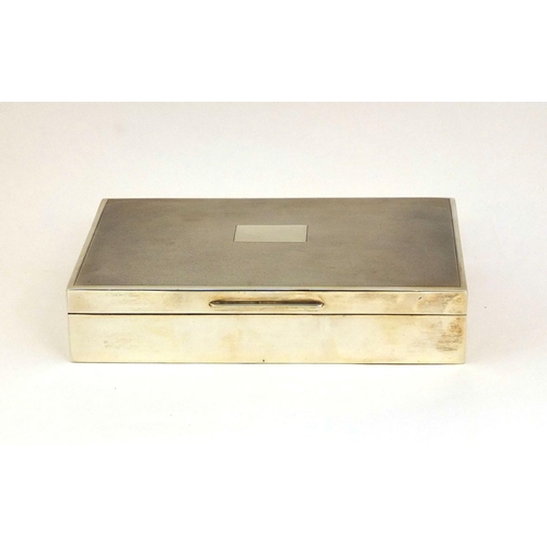 672 - Rectangular silver cigar box, the lid with engine turned decoration, S & M Birmingham 1978, 16cm lon... 