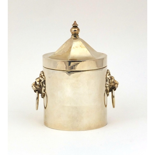 656 - Cylindrical silver caddy with lion mask handles, HU Birmingham 1990. 9.5m high, approximate weight 1... 