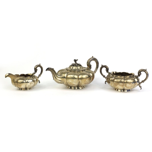 651 - Georgian silver three piece melon tea service,  C.G London 1837, the teapot 28cm long, approximate w... 