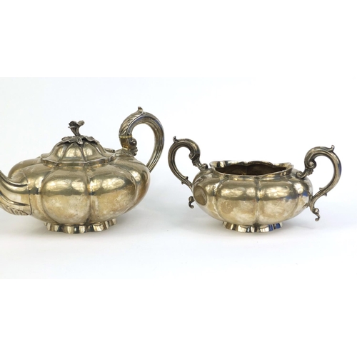 651 - Georgian silver three piece melon tea service,  C.G London 1837, the teapot 28cm long, approximate w... 