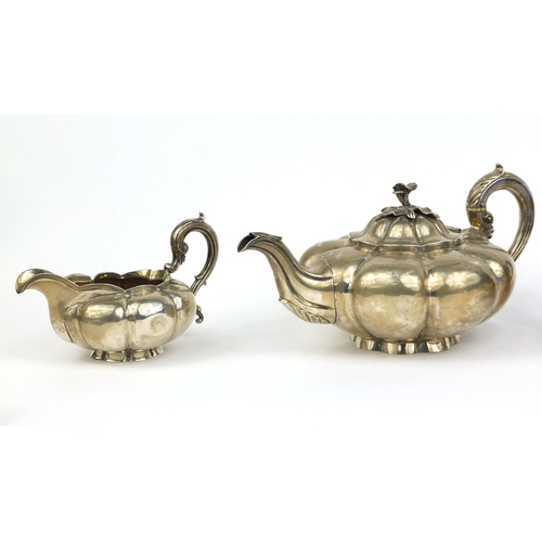 651 - Georgian silver three piece melon tea service,  C.G London 1837, the teapot 28cm long, approximate w... 