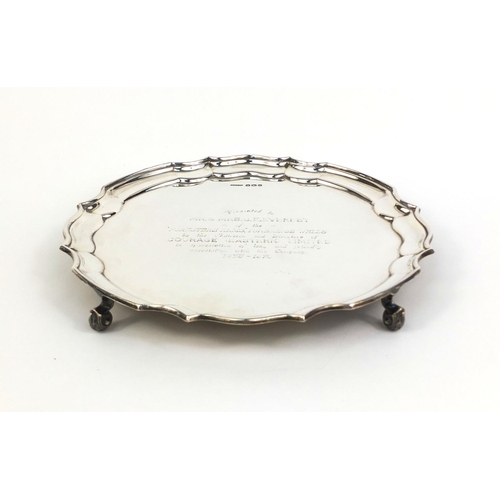 667 - Circular silver four footed salver, J.T & Co Sheffield 1968, 20.5cm in diameter, approximate weight ... 