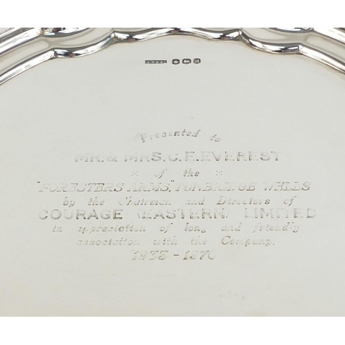 667 - Circular silver four footed salver, J.T & Co Sheffield 1968, 20.5cm in diameter, approximate weight ... 