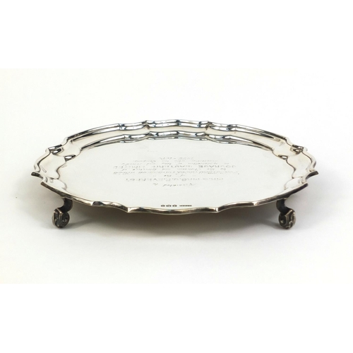 667 - Circular silver four footed salver, J.T & Co Sheffield 1968, 20.5cm in diameter, approximate weight ... 